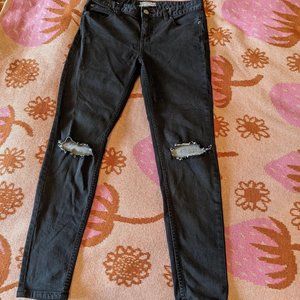Black distressed skinny jeans from Free People